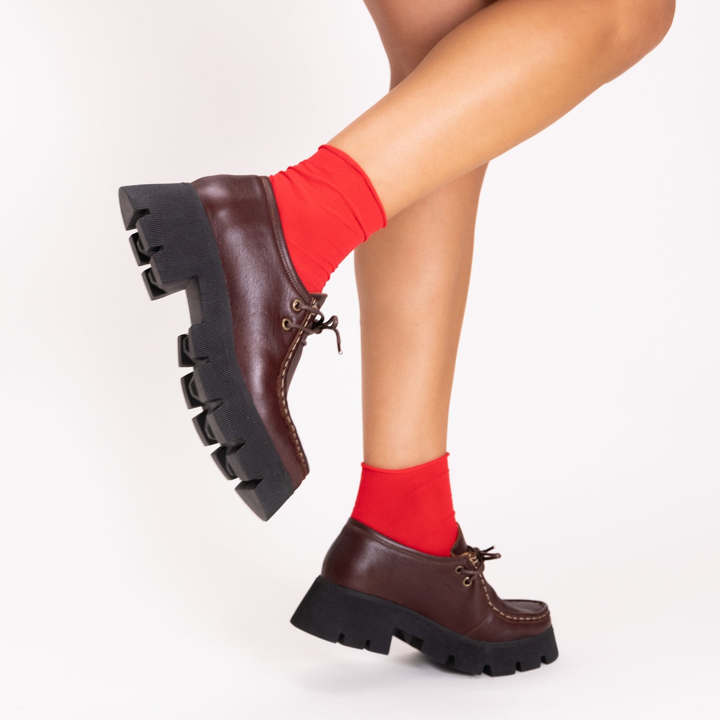 Naomi Coffee Brown Chunky Loafer By Mafalda Handmade Model wears with bright red socks 