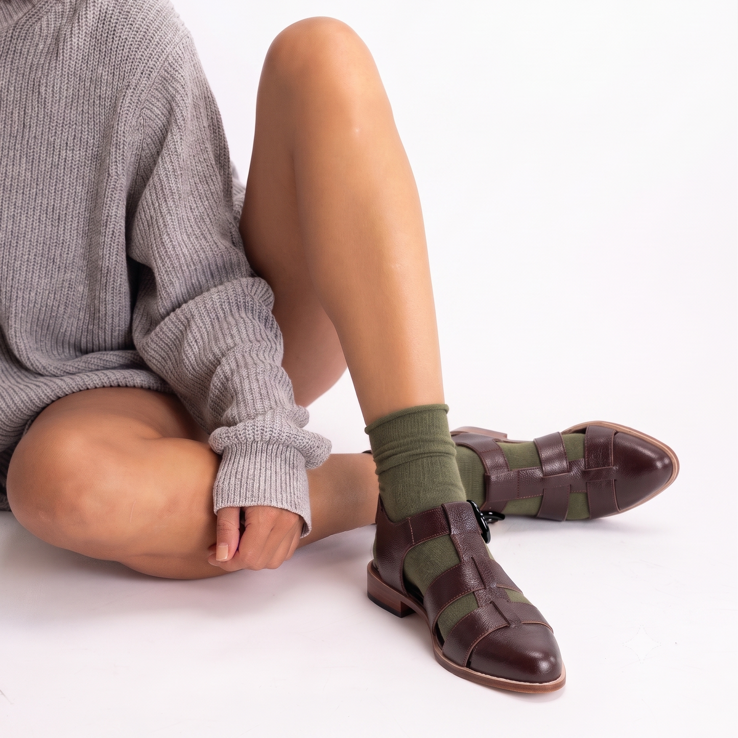 Model wearing mafalda handmade brown pointy tow fisherman sandals